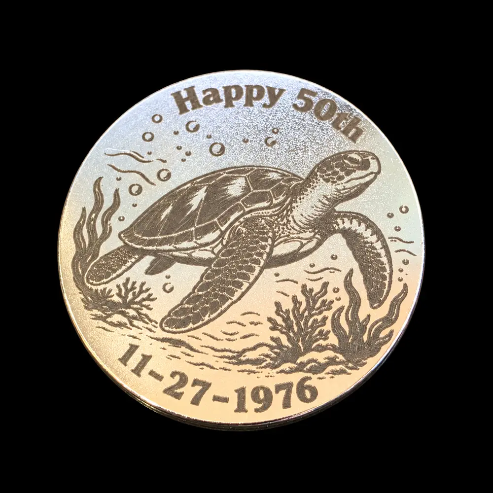32 mm laser-engraved token by TxLooT: 50th birthday · personalized keepsake